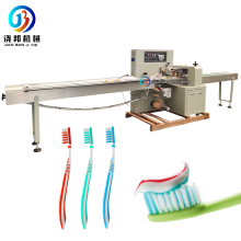 JB-250X Hot-Selling Automatic Flow Pack Machine for Hotel Supplies Plastic Hair Comb / Soap / Toothbrush /Shaving Razors